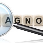 Schriftzug Diagnose unter der Lupe